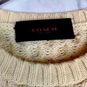 Cable knit coach sweater